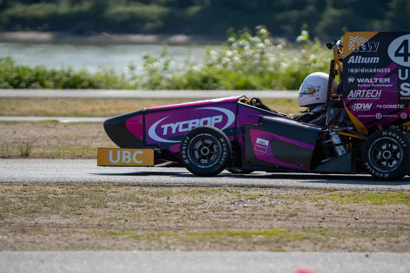 The 2026 car on track at Mission, side view